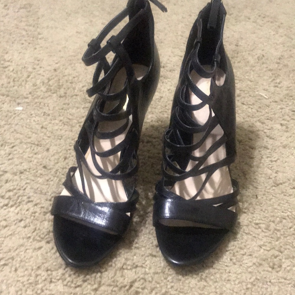 Black leather gladiator sandals